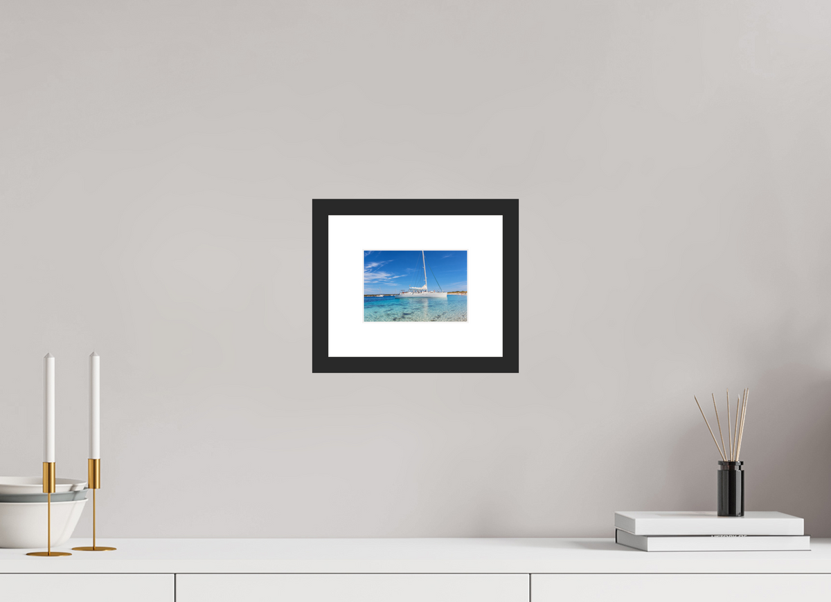 DIN A6 (14,8 x 10,5 cm), Fineartprint im Rahmen - schwarz Azure Serenity – Sailboat on Turquoise Waters